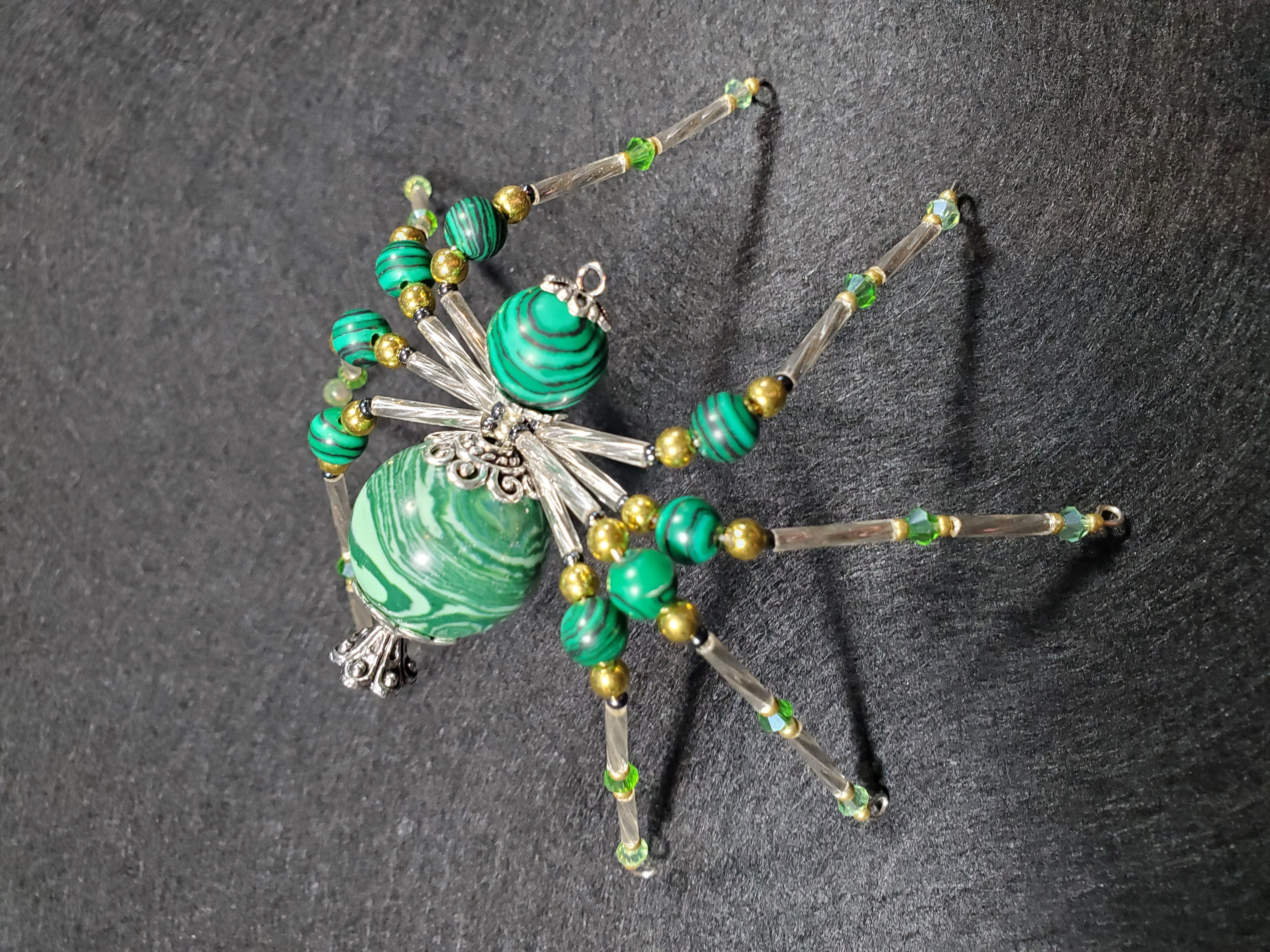 Forest Whisper Spider detail showing gold wire accents
