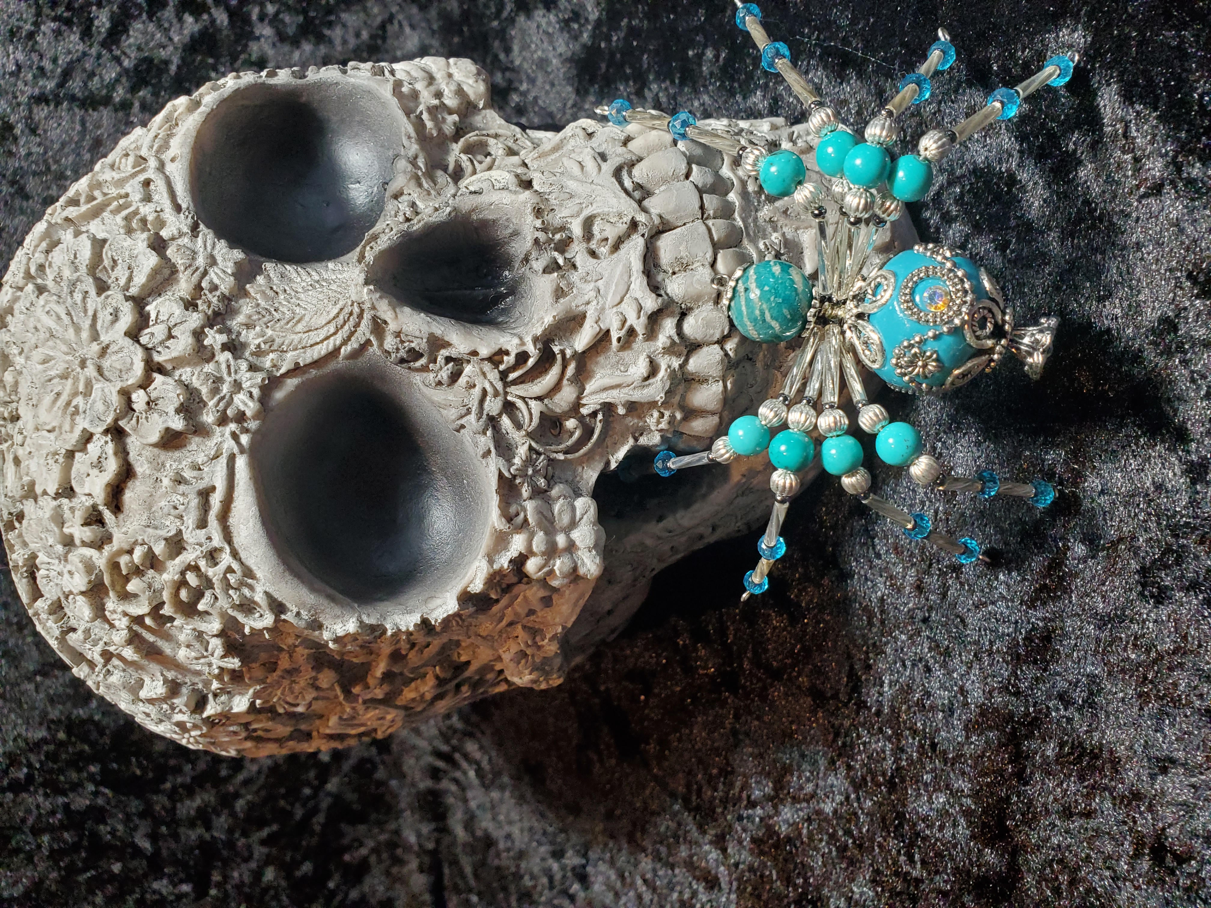 Ocean Dream Spider with coral fossil background highlighting the ocean theme